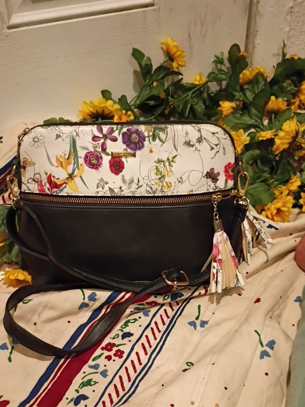 Floral-Trim Black Crossbody Bag with Tassel Charm